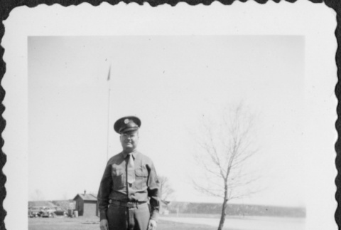Man standing in field (ddr-densho-434-419)