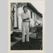 James Nakamura outside a barrack (ddr-densho-37-901)