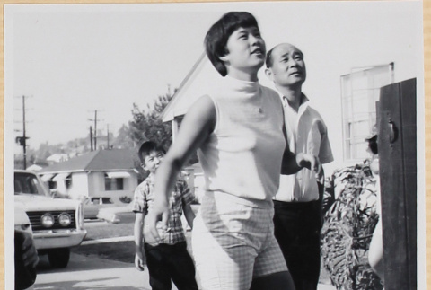 Woman, man and boy standing in driveway (ddr-densho-522-90)