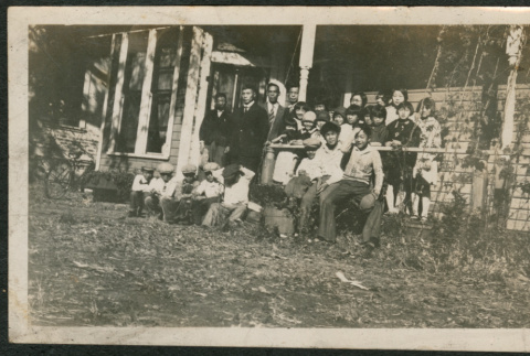 Group posing on porch of house (ddr-densho-293-201)