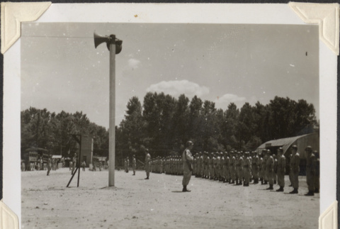 Row of men standing at attention (ddr-densho-466-758)