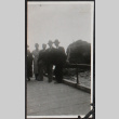 Men standing on dock (ddr-densho-326-147)