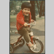 Boy on tricycle (ddr-densho-523-547)