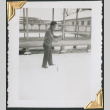 Man in snow holding something (ddr-densho-434-294)