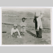 Susumu and Tory Miyoshi at beach (ddr-densho-480-159)
