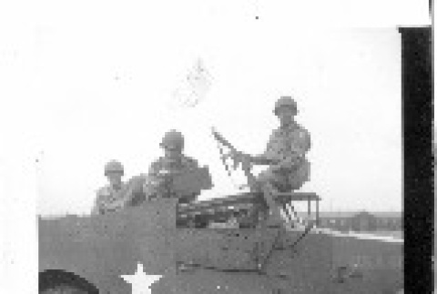 Men in Military Vehicle (ddr-csujad-13-4)