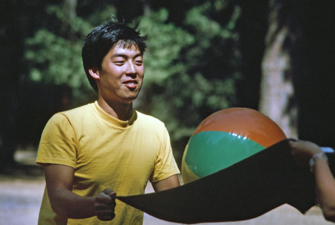 Stan Morita during balloon toss (ddr-densho-336-1576)