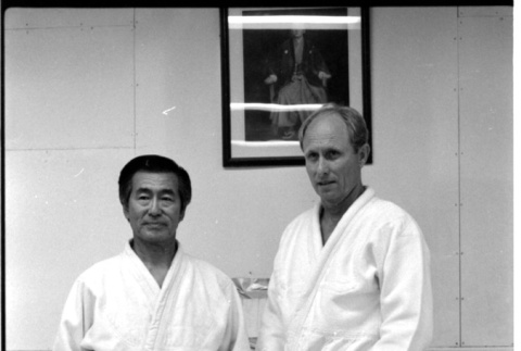 Frank S. Emi and an unidentified person dressed in gi at the Hollywood Judo Dojo (ddr-densho-1007-1268)