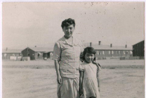 A Japanese American woman and girl pose for camera (ddr-densho-362-5)
