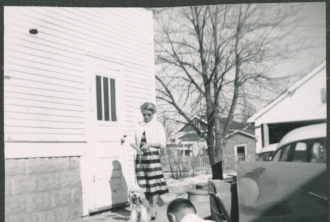 Agnes Sakura with dog (ddr-densho-523-302)