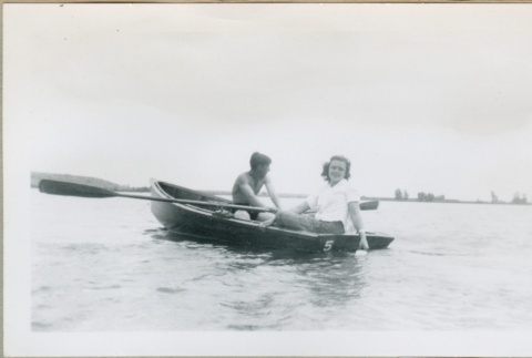 A couple in a row boat (ddr-densho-300-97)