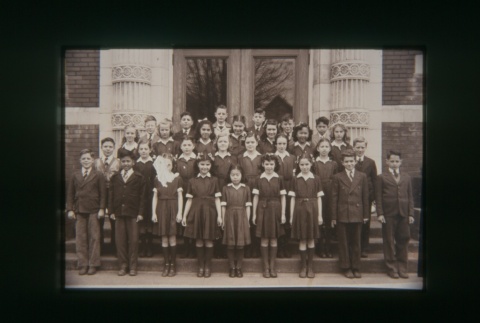 (Slide) - Image of group of boys and girls standing on steps outside building (ddr-densho-330-191-master-d362774963)