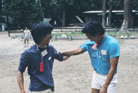 Danny Akagi and Roger Morimoto during games (ddr-densho-336-1913)