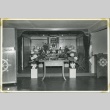 Altar with offerings at the Manzanar Buddhist Church (ddr-manz-4-199)
