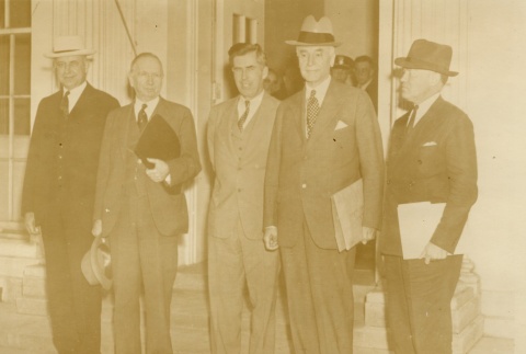 Henry A. Wallace and others standing outside of a building (ddr-njpa-1-2479)