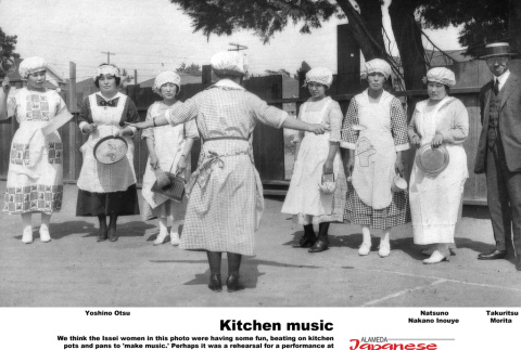 Group of women in aprons and bonnets beating on pots and pans (ddr-ajah-3-345)