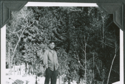 Joe Iwataki standing in snow (ddr-ajah-2-349)