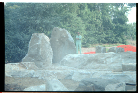 Man by rocks (ddr-densho-377-1800)