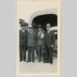 Co-op delegates pose in front of a truck (ddr-densho-37-866)