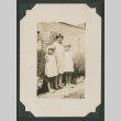three girls outside a house (ddr-densho-378-510)