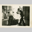 Pounding steamed rice at camp (ddr-densho-37-1311)