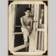 Hiro on a porch (ddr-densho-542-542)