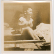 Young boy sitting on table (ddr-densho-426-2124)