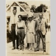 Charles and Anne Lindbergh standing on a dock with the Morrows (ddr-njpa-1-1180)