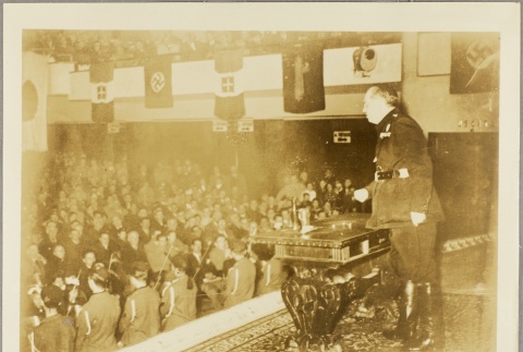 Italian military leader giving a speech in a meeting hall (ddr-njpa-13-692)