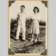 Frank Eye and Mits Kikawa beside a garden (ddr-densho-542-512)