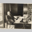 Konstantin Yurenev seated at his desk (ddr-njpa-1-2635)