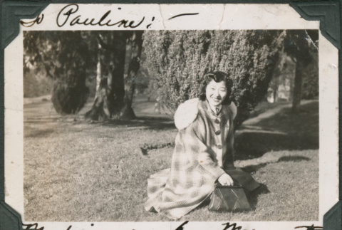 Woman sitting on lawn (ddr-densho-316-368)