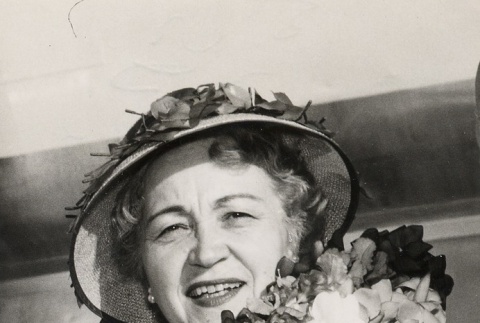 A woman wearing leis (ddr-njpa-1-1122)