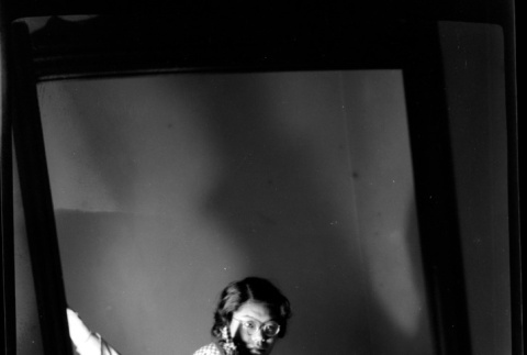 Tomoye (Nozawa) Takahashi self-portrait taken in mirror (ddr-densho-426-1576)