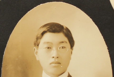Portrait of Nikkei man in a suit (ddr-densho-259-436)