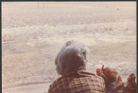 Two people looking out over water (ddr-densho-523-629)