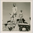 Soldier next to statues (ddr-densho-201-439)