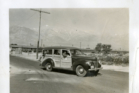 Departure by WRA Escort in Station Wagon en Route to Reno (ddr-densho-343-33)