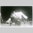 Man in tent with glasses (ddr-densho-1007-851)
