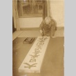 Man painting calligraphy (ddr-njpa-4-194)