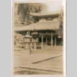Two women standing in front of large temple (ddr-densho-426-1548)