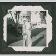 A man on a city street (ddr-densho-471-202)
