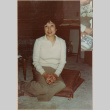 Woman seated on floor cushions (ddr-densho-426-2229)