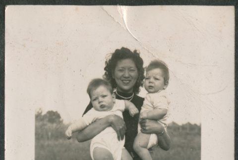 Woman holding two babies (ddr-densho-316-406)