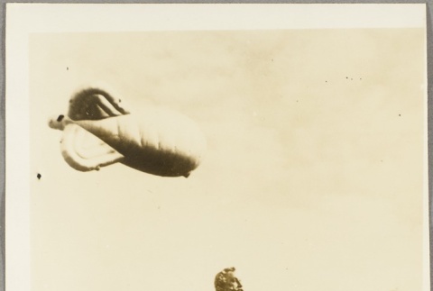 British blimp flying over a statue (ddr-njpa-13-192)
