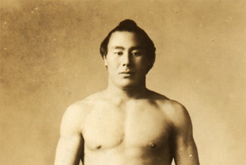 Sumo wrestler posing in mawashi (ddr-njpa-4-1381)