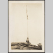 Woman sitting atop a rock (ddr-densho-433-1122)