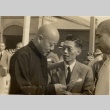 Two men speaking (ddr-njpa-1-1725)