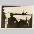 Sailors on board a ship looking at other ships nearby (ddr-njpa-13-750)