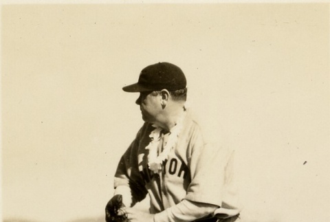 Babe Ruth winding up, wearing a lei (ddr-njpa-1-1400)